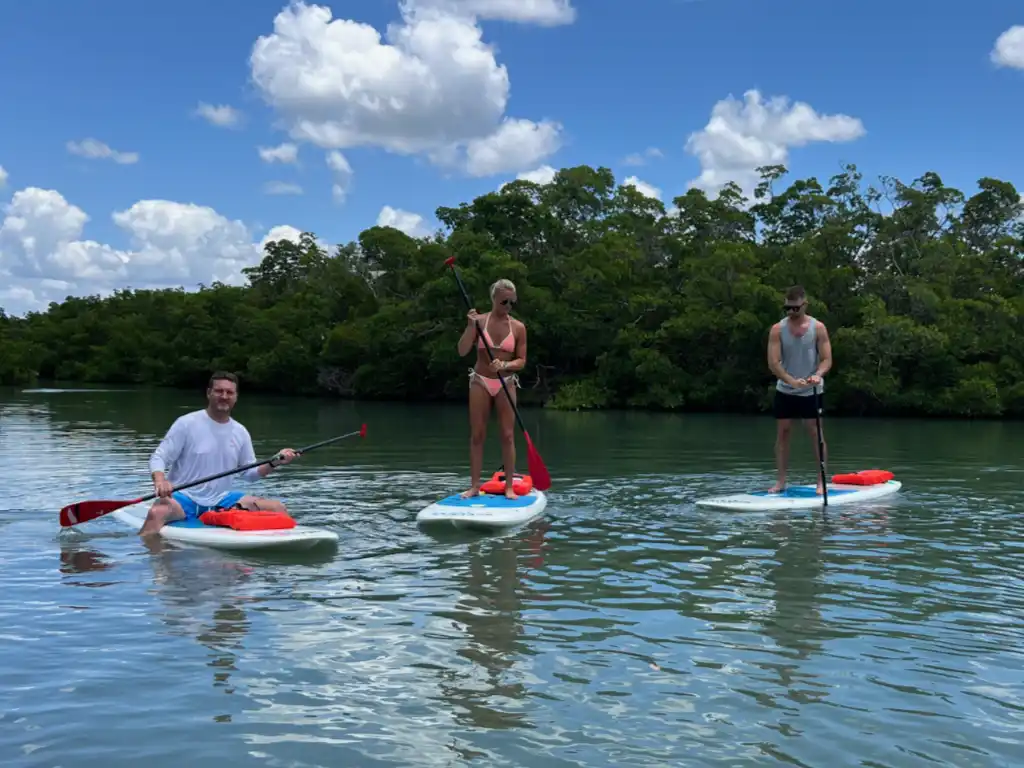 Friends enjoying SUP stand up paddle boards